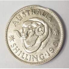AUSTRALIA 1961 . ONE 1 SHILLING . ERROR . CLIPPED PLANCHET . BITTEN EDGE